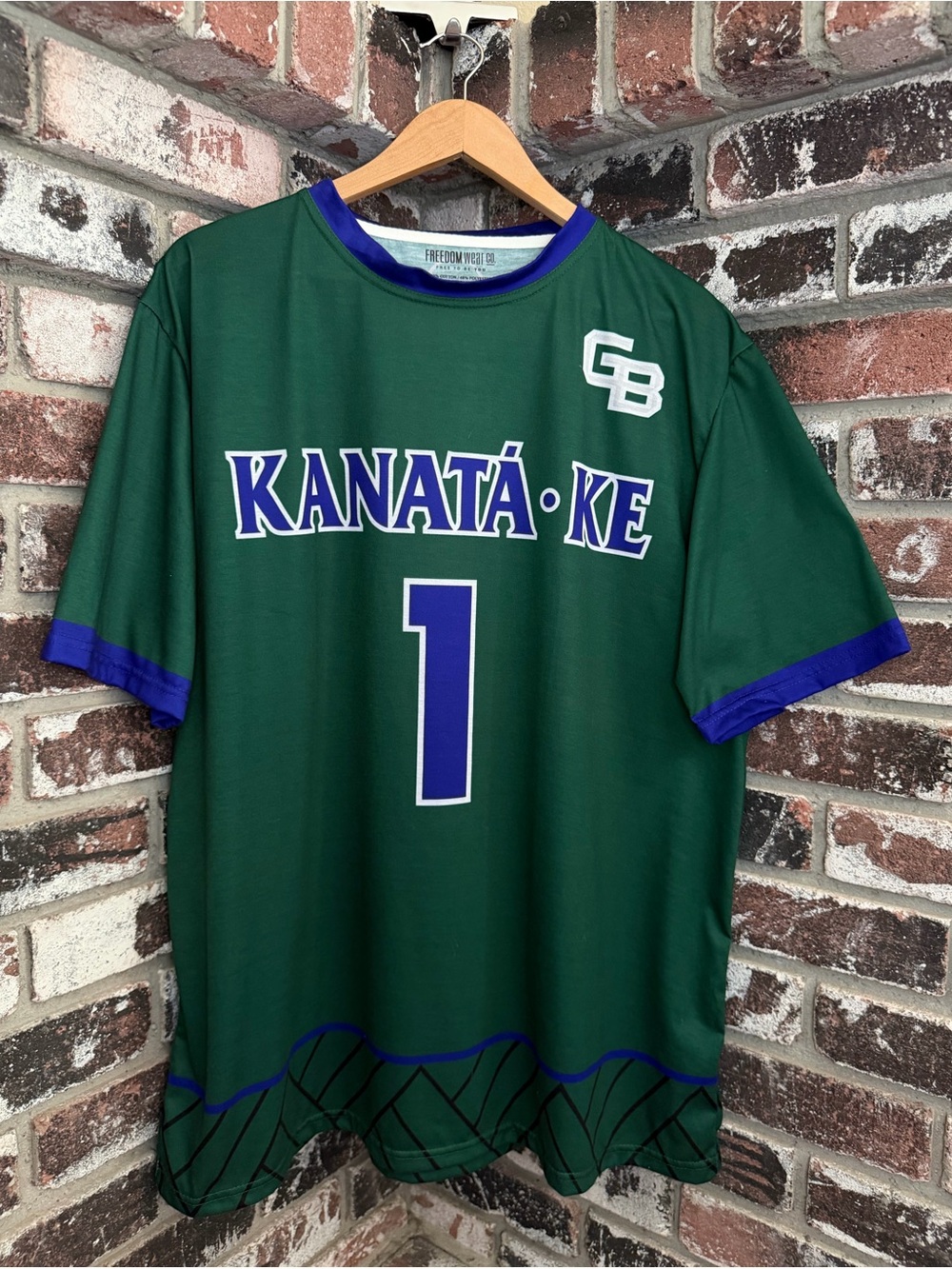 Kanatá·ke Oneida Nation Celebration Uniform #1 Onʌyote?a·ká• Jersey Top